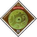 Colnect-4147-656-Chinese-New-Year--Jade-sword-pommel.jpg