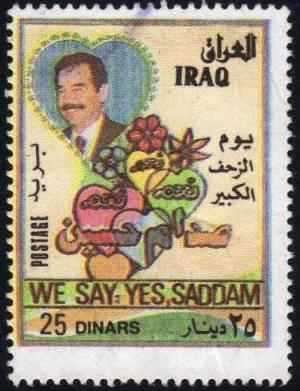 Colnect-1781-726-Saddam-Hussein-1937-2006-president--flowers-and-hearts.jpg