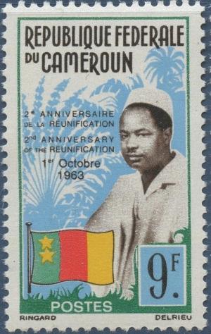 Colnect-2149-541-President-Ahmadou-Ahidjo-and-flag.jpg