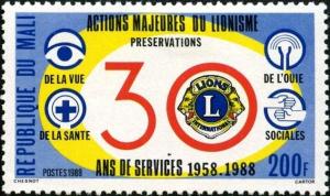 Colnect-2527-046-Emblem-inside-%E2%80%9C30%E2%80%9D-and-Symbols-of-Lions-Club-Activities.jpg