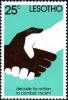 Colnect-1730-155-Black-and-white-handshake.jpg