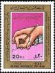 Colnect-2114-336-A-hand-guides-a-child-s-hand-while-writing.jpg