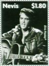 Colnect-5206-386-Elvis-wearing-black-leather-facing-forward.jpg