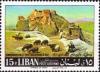 Colnect-1380-716-Citadel-of-Chekif-and-grazing-sheep.jpg