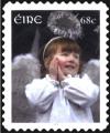 Colnect-2461-501-Girl-dressed-as-an-angel.jpg