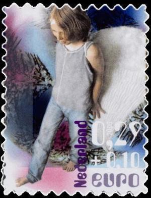 Colnect-667-610-Child-dressed-up-as-angel.jpg