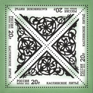 Colnect-2138-810-Small-Rosette-Framed-Asymmetrical-Ornament.jpg