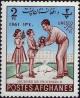 Colnect-1430-258-Children-giving-flowers-to-teacher-overprinted.jpg