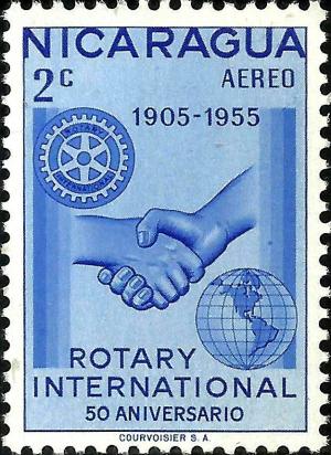 Colnect-2653-216-Emblem-Hand-shake-and-Globe.jpg