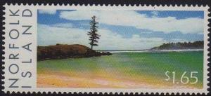 Colnect-4087-703-Sandy-shore-and-headland-with-single-pine-tree.jpg