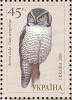 Colnect-998-335-Northern-Hawk-Owl%C2%A0Surnia-ulula.jpg