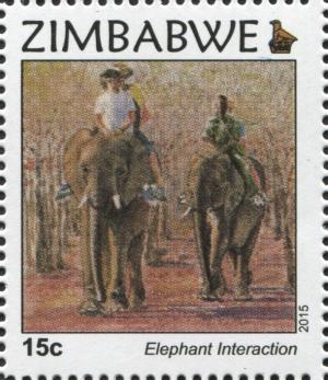 Colnect-3562-360-African-Elephant-Loxodonta-africana-with-Riders.jpg