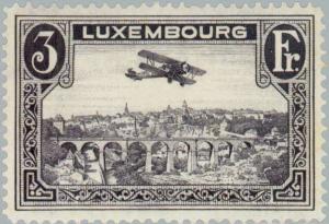 Colnect-133-510-Biplane-over-Luxembourg-City.jpg