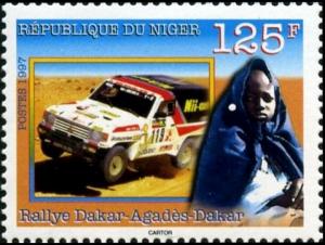 Colnect-2644-756-Mitsubishi-Off-road-Vehicle-and-Bedouin-Girl.jpg