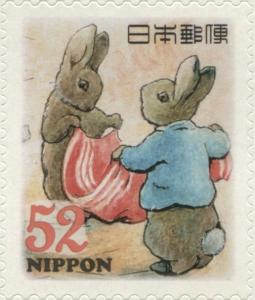 Colnect-3046-971-Rabbits-Holding-Towel--Peter-Rabbit-Characters.jpg