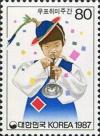 Colnect-2770-432-14th-Philatelic-week---boy-playing-the-nalrali.jpg