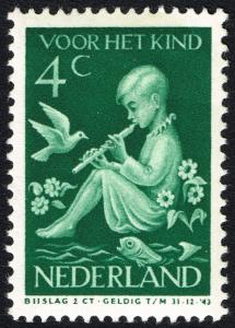 Colnect-2190-864-Child-with-flute-and-bird.jpg