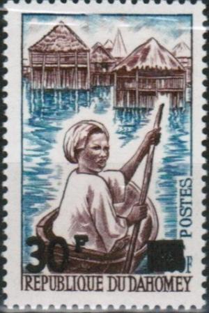 Colnect-1854-489-Woman-in-Canoe.jpg