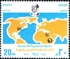 Colnect-2407-495-24th-Anniversary---World-Map-Pres-Sadat-and-Emblems.jpg