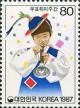 Colnect-2770-432-14th-Philatelic-week---boy-playing-the-nalrali.jpg